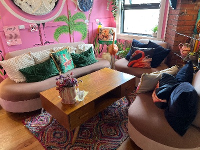 Inside sofa seating and coffee table. Opens the photo gallery.