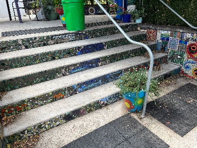 Steps to outside dining area. Opens the photo gallery.